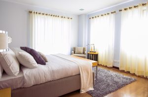 small room with simple furniture and clear walking space